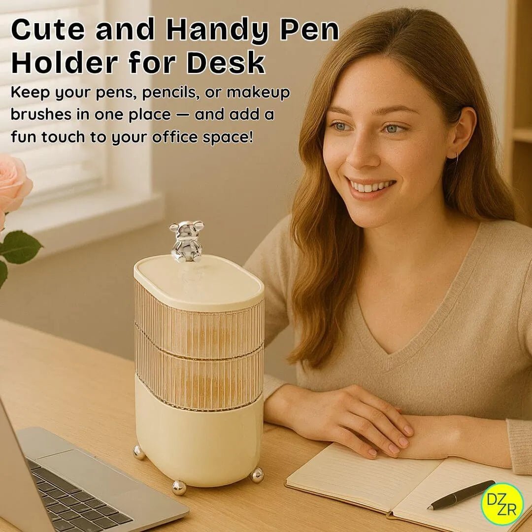 Woman sitting at a desk with a cute and handy pen holder, laptop, and notebook.